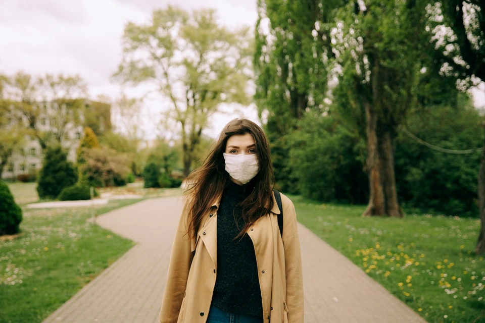 person outside wearing mask